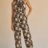 Printed long jumpsuit with halter neckline