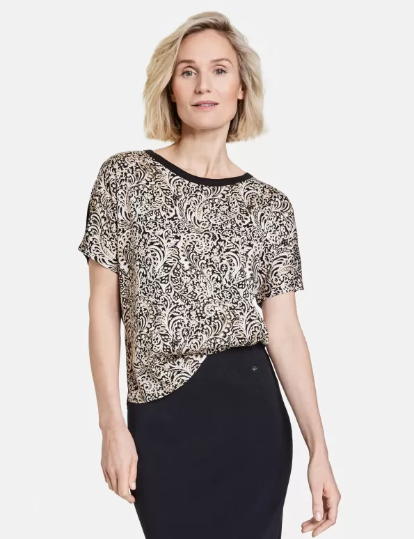 Patterned short sleeve top with side slits