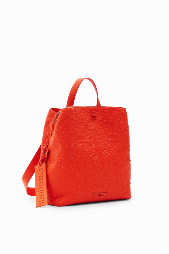Small geometric embossed backpack