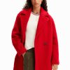 Double-breasted bouclé coat