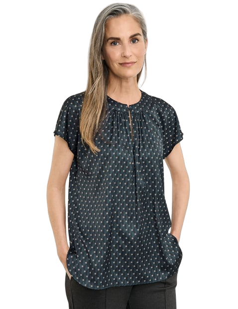 Flowing short sleeve blouse with a graphic pattern