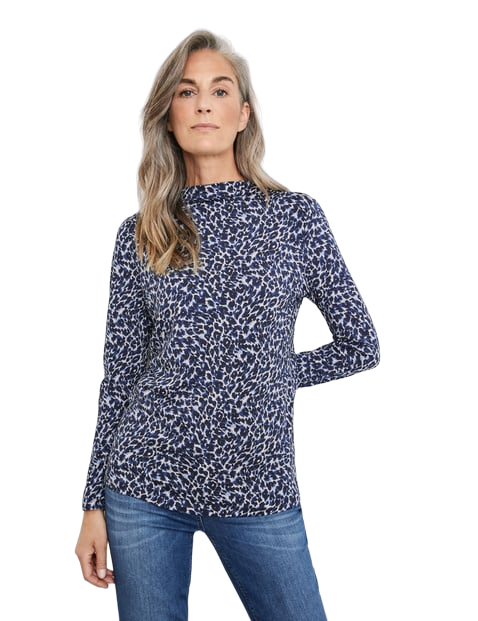Patterned long sleeve top with a turtleneck