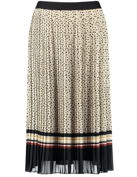 Polka dot pleated skirt with an elasticated waistband