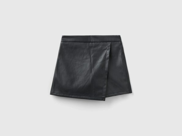 TROUSERS IN IMITATION LEATHER FABRIC