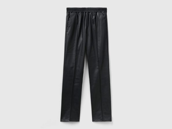 SLIM FIT TROUSERS IN IMITATION LEATHER FABRIC