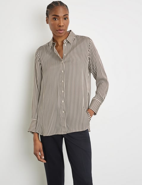 Striped shirt blouse with a rounded hem