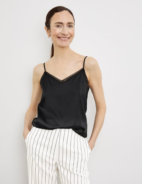 Top with fabric panelling