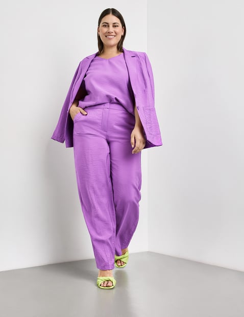 Wide trousers with a subtle shimmer