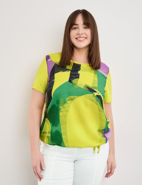 Short sleeve top with a drawstring